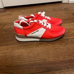 Michael Kors orange sneakers white stripe never worn 
#sneakers #MichaelKors